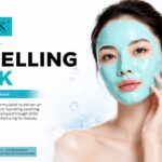 Model wearing a light blue spa-grade modelling peel-off mask against a background of water splashes and aloe vera.